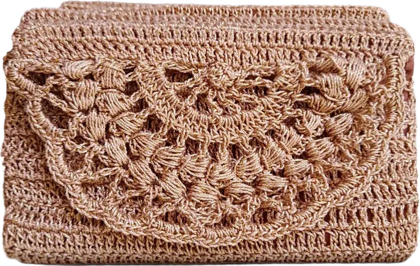 A rose-gold crochet clutch with a scalloped lace flap.