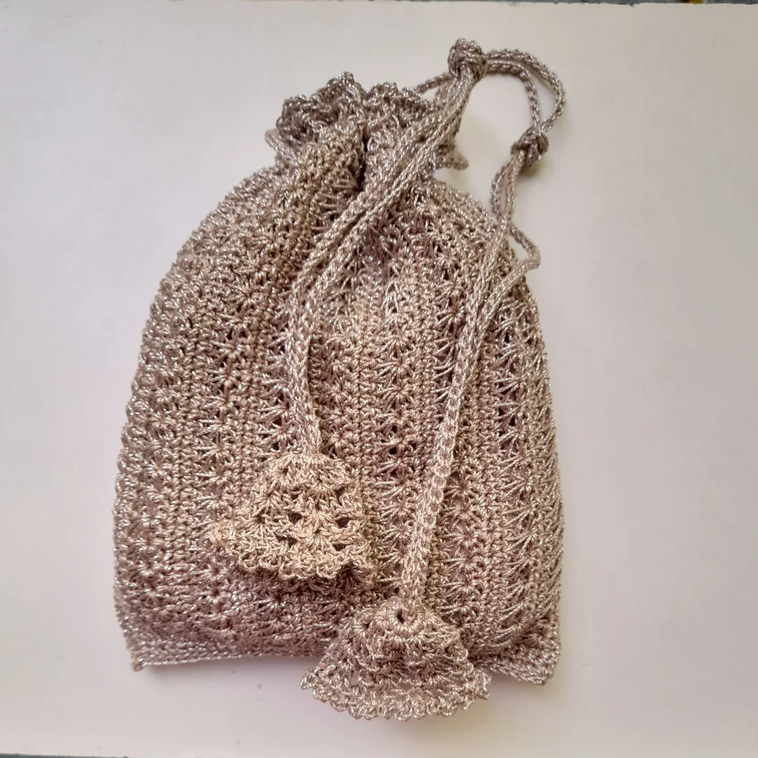 A hand-crocheted potli bag.