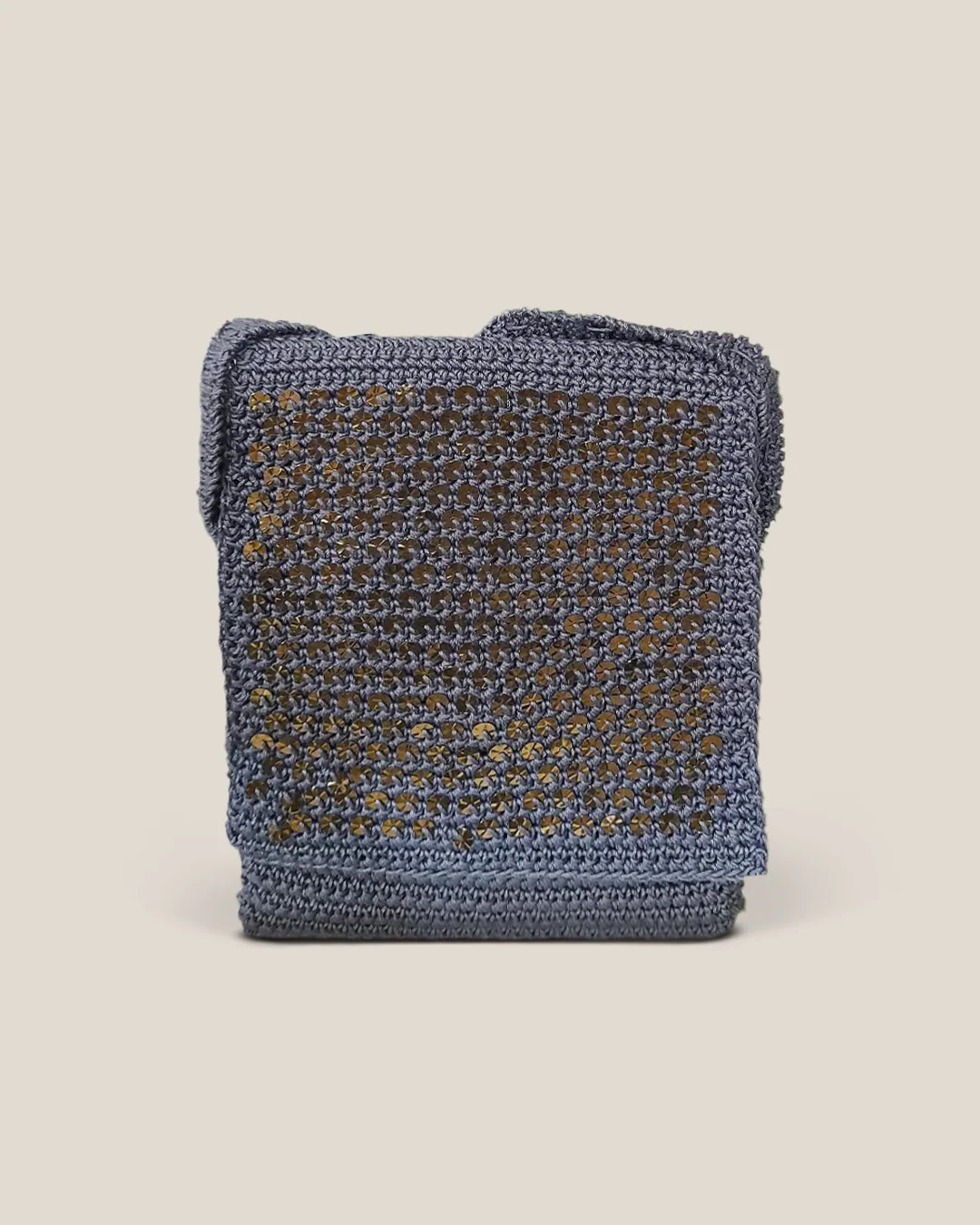 A blue-grey crochet sling bag with a fold-over flap covered in rows of bronze sequins.